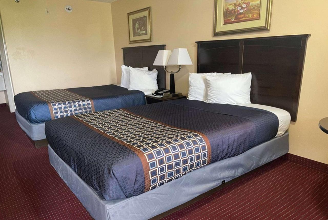 Carom Inn A Travelodge By Wyndham Denham Springs-Baton Rouge ภายนอก รูปภาพ