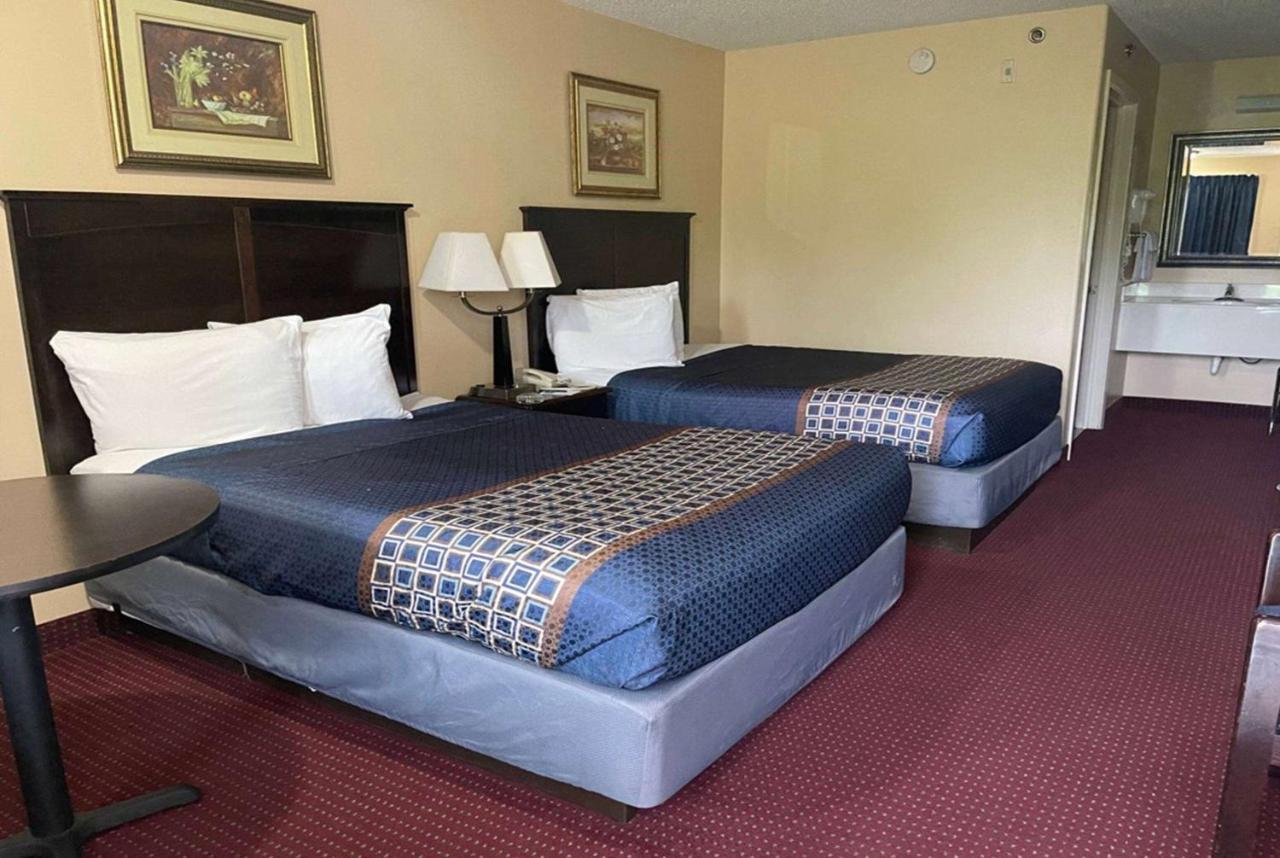 Carom Inn A Travelodge By Wyndham Denham Springs-Baton Rouge ภายนอก รูปภาพ