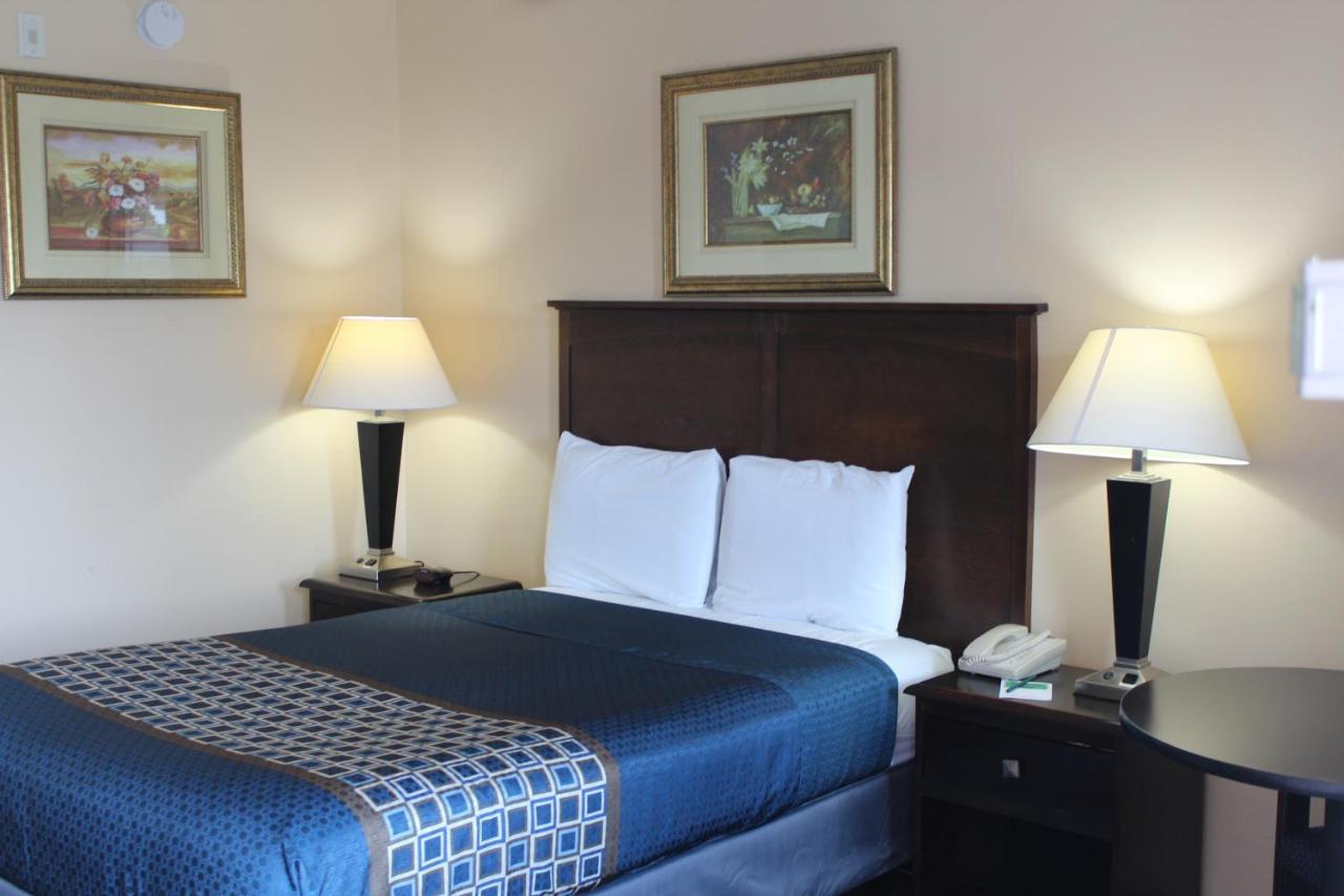 Carom Inn A Travelodge By Wyndham Denham Springs-Baton Rouge ภายนอก รูปภาพ